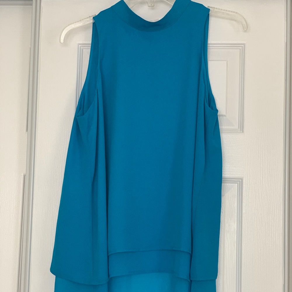 Silky sleeveless mock neck high low tunic